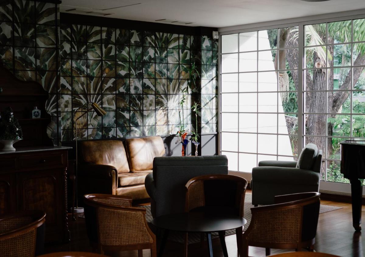 Uma área de estar em Quintinha Sao Joao Hotel & Spa