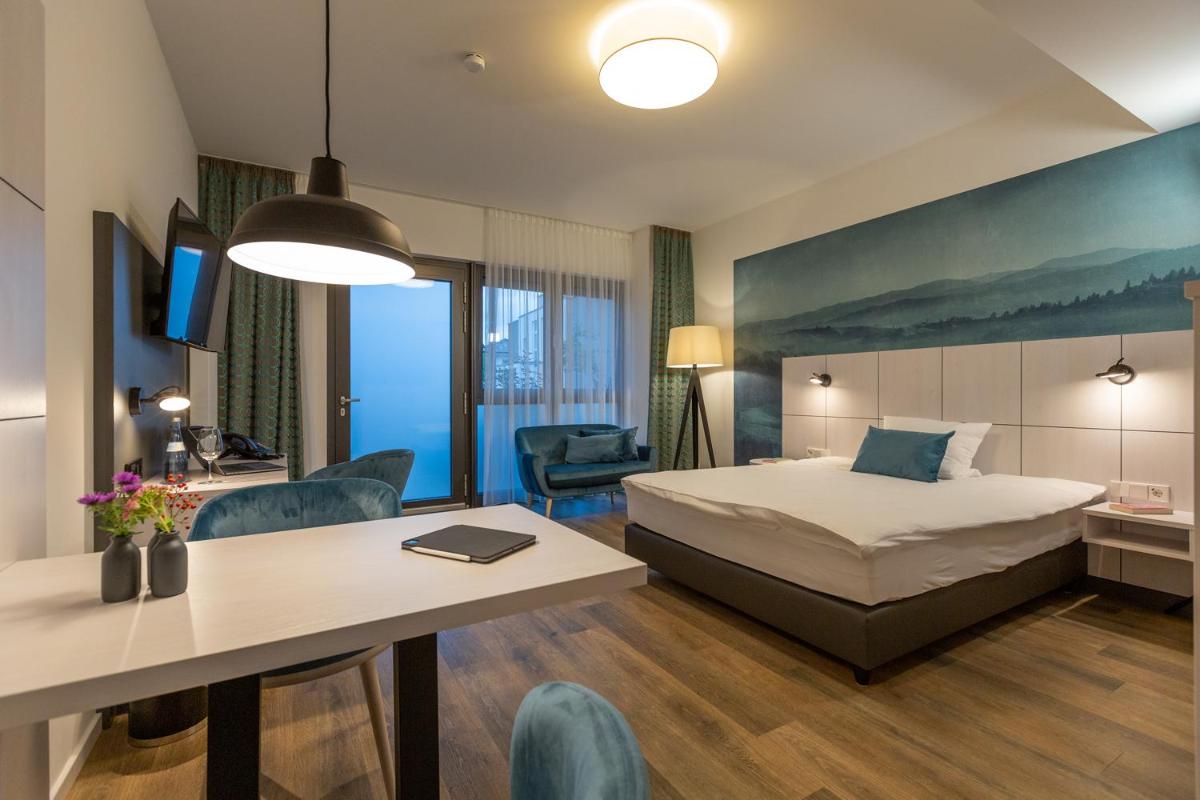 Boardinghouse Hirsch - Apartments in Kork - Housity