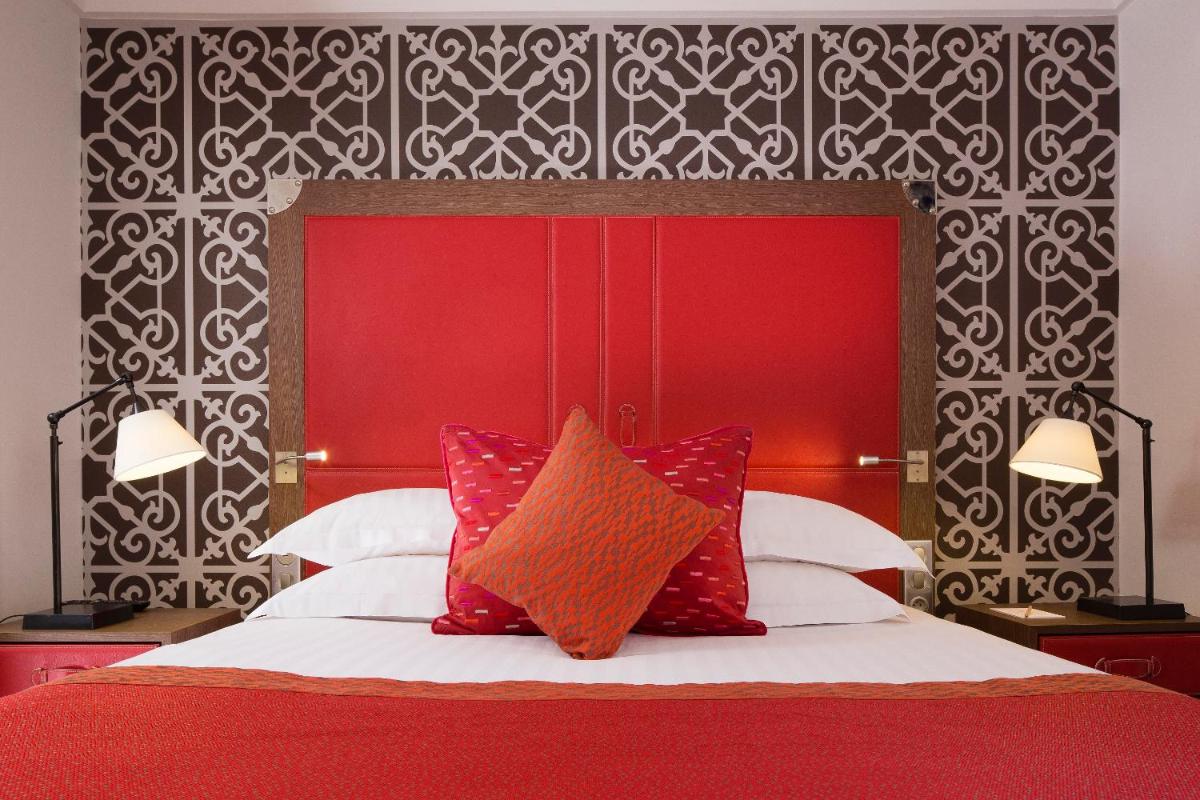 Un ou plusieurs lits dans un hébergement de l'établissement Hotel Phileas Lazare & Spa - Opera