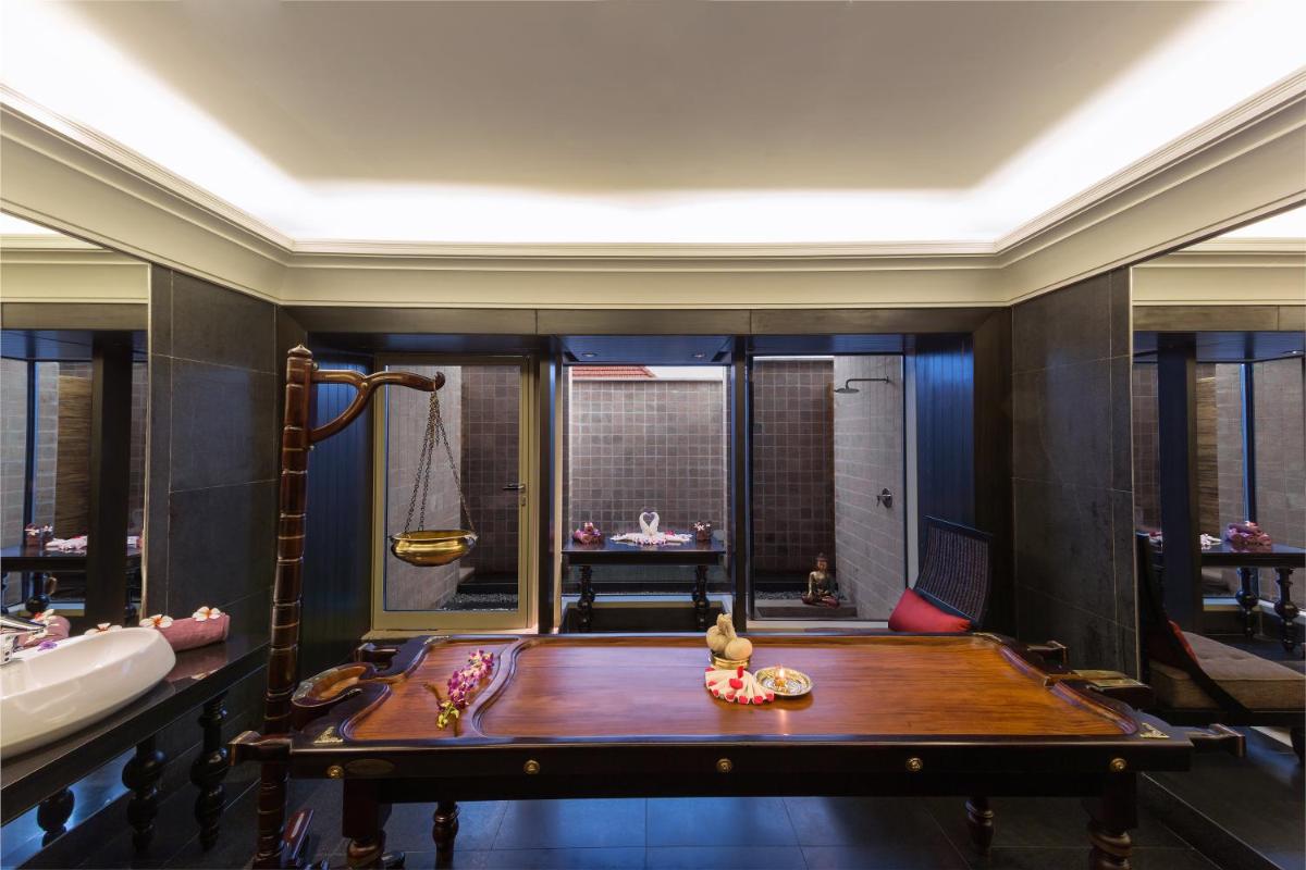 a room with a pool table and a tub at Crowne Plaza Kochi by IHG in Cochin
