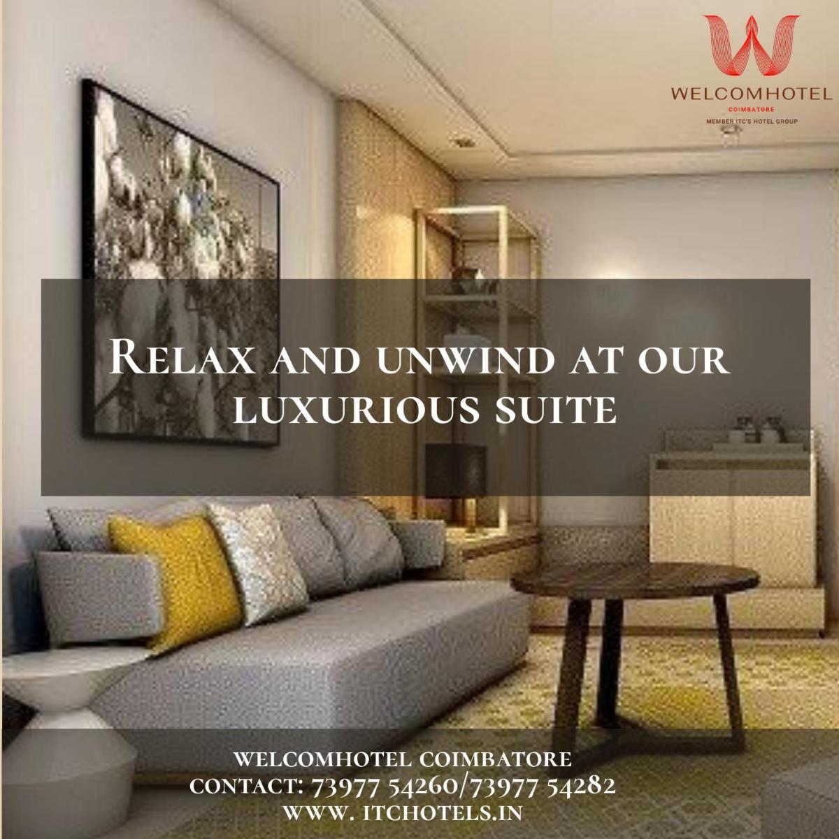 a living room with a couch and a table at Welcomhotel by ITC Hotels, RaceCourse, Coimbatore in Coimbatore