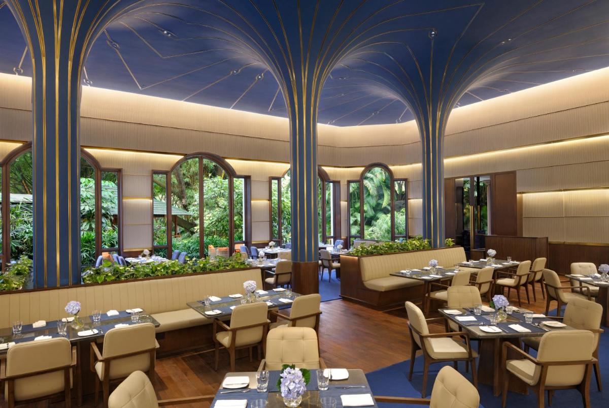 a rendering of a restaurant with tables and chairs at The Oberoi Bengaluru in Bengaluru a rendering of a restaurant with tables and chairs at The Oberoi Bengaluru in Bengaluru