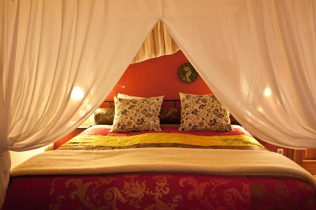 Uma cama ou camas num quarto em Hotel Rural Quinta da Geia