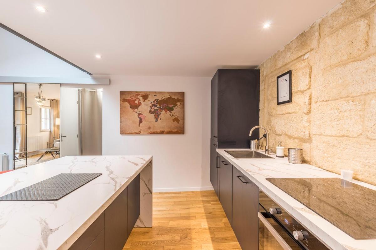 La Parenthèse Roucher Montpellier - Duplex Climatisé T2 Cœur écusson MEUBLE TOURSIME 3 ETOILES - Housity