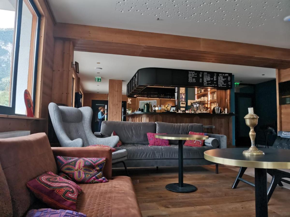 Coin salon dans l'établissement L'Outa Hotel Restaurant