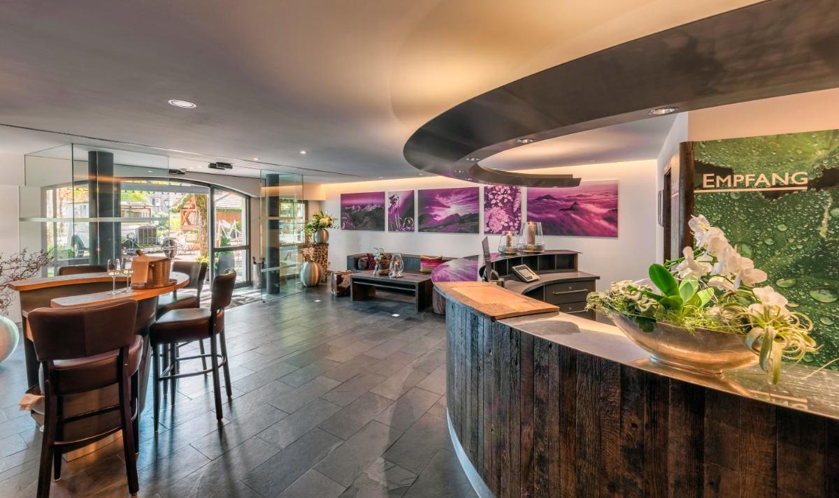 Ein Sitzbereich in der Unterkunft Hotel Maximilian