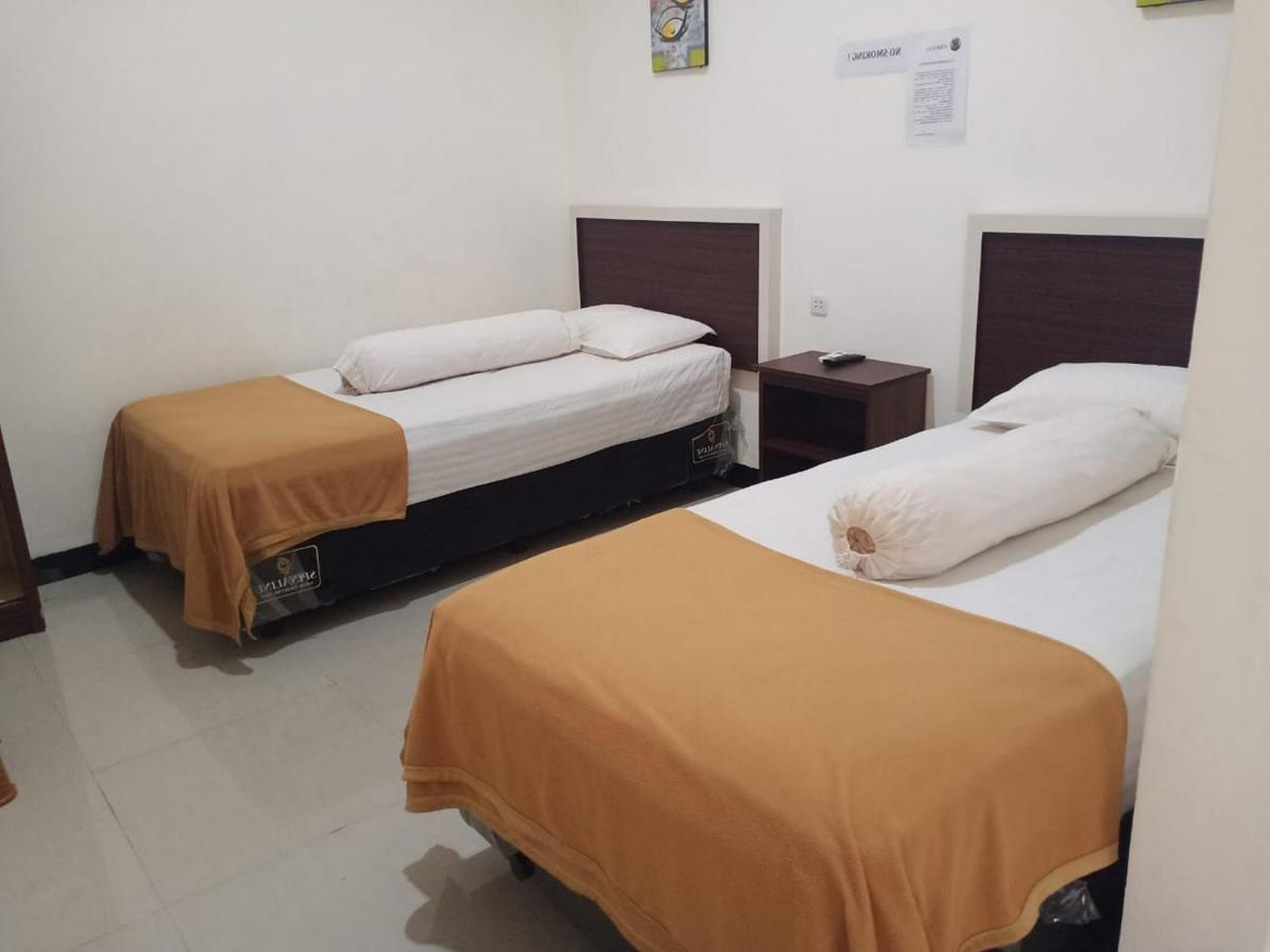 Fidelia Homestay Palu Mitra RedDoorz - Housity