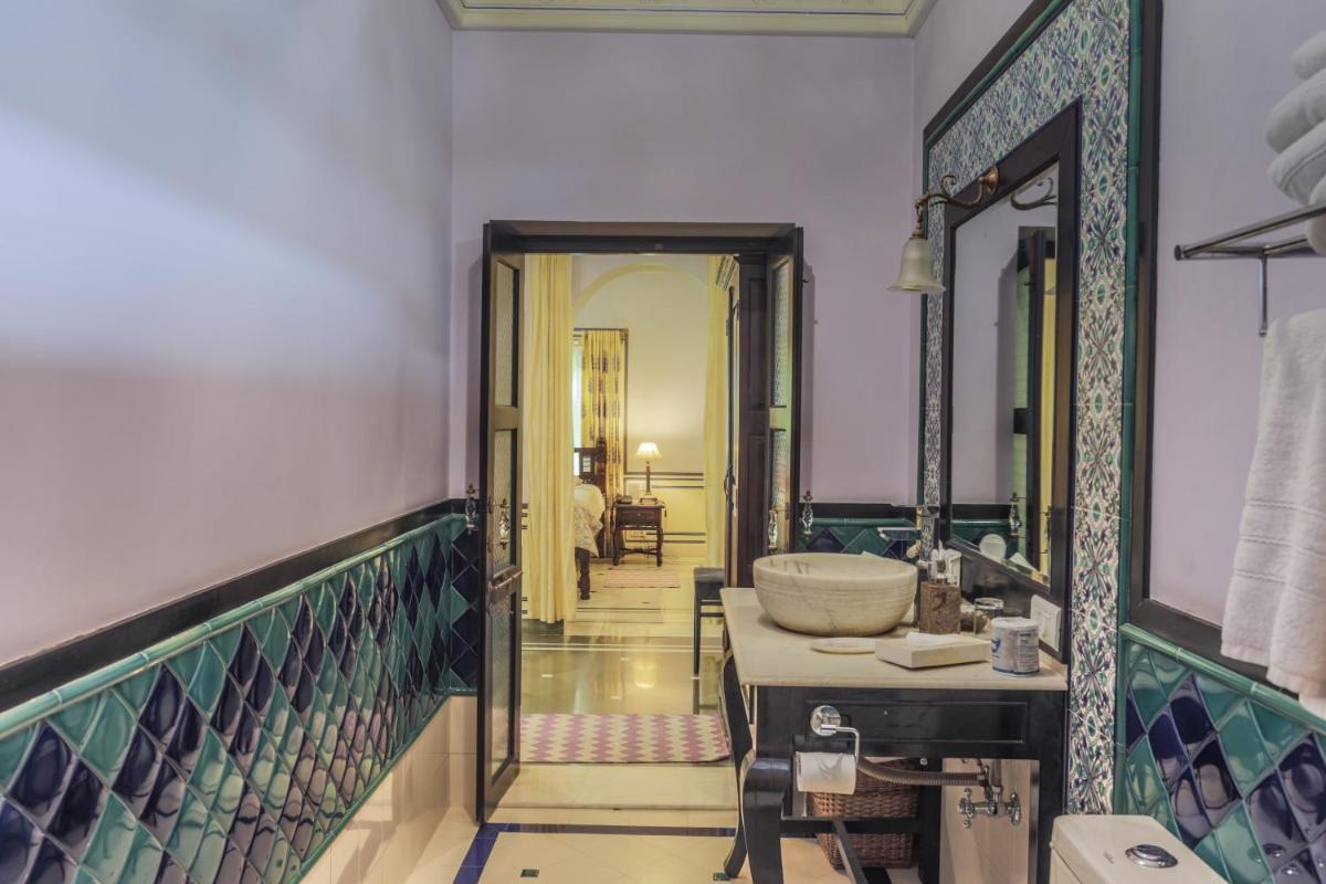 a bathroom with a sink and a mirror at Royal Heritage Haveli - By Leisure Hotels in Jaipur
