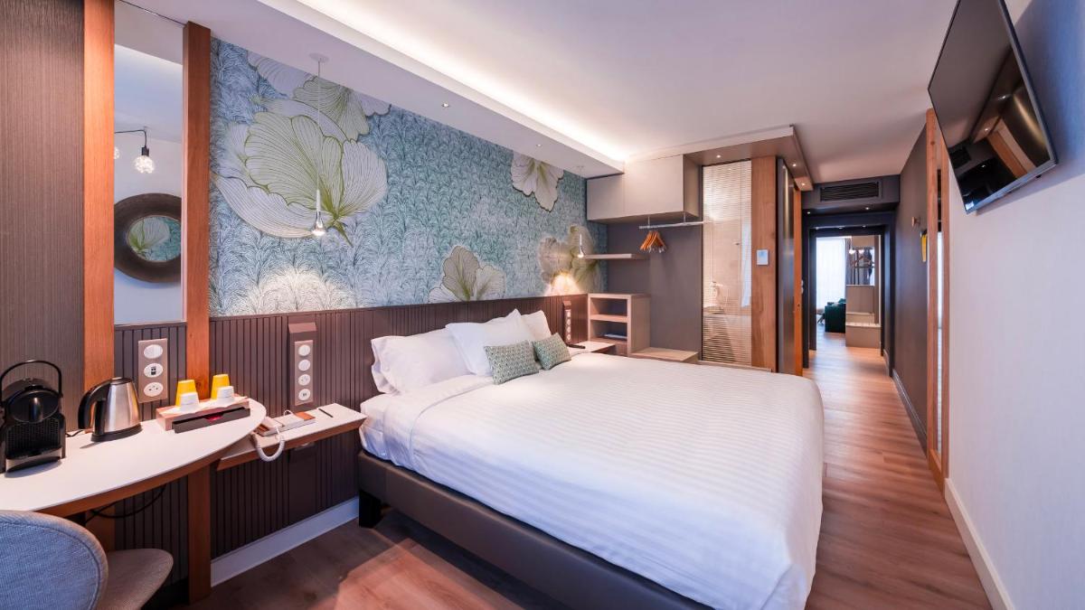 Un ou plusieurs lits dans un hébergement de l'établissement voco Strasbourg Centre - The Garden by IHG