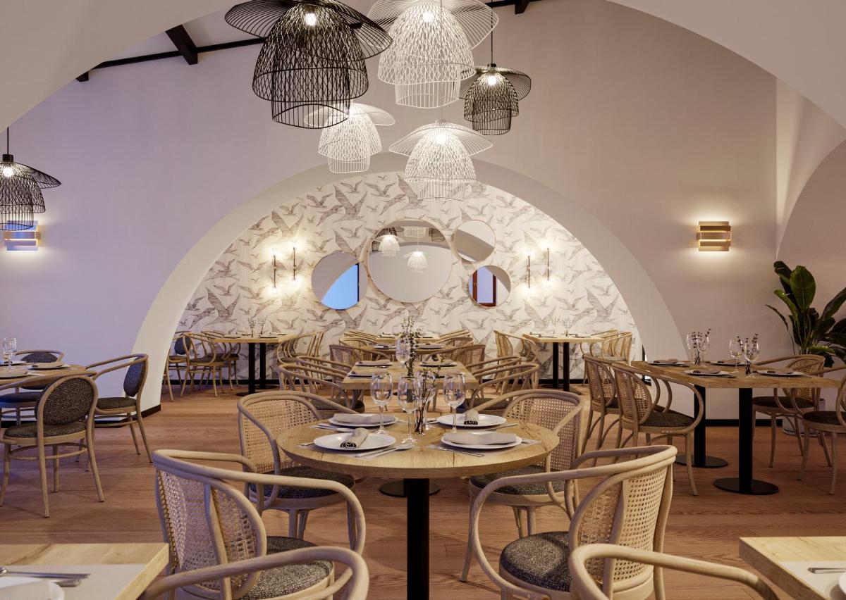 Un restaurante o sitio para comer en Hospes Palacio de Arenales & Spa