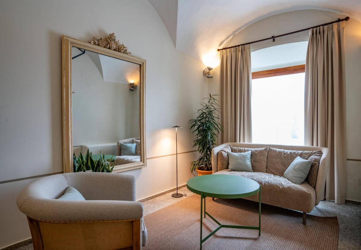 Zona de estar de Hospes Palacio de Arenales & Spa