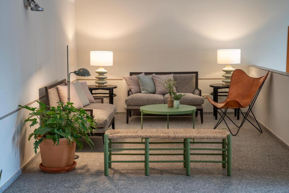 Zona de estar de Hospes Palacio de Arenales & Spa
