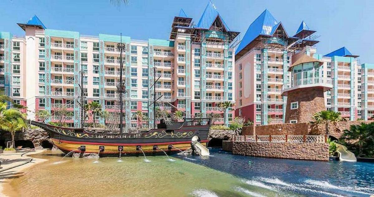 Grande Caribbean Condo by Somphong - Housity
