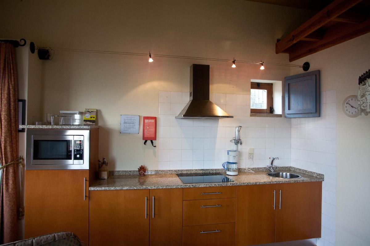 A cozinha ou kitchenette de Hotel Rural Quinta da Geia