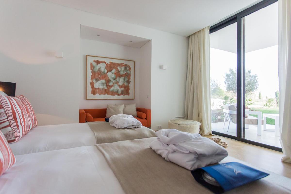 Uma cama ou camas num quarto em Monte Rei Golf & Country Club