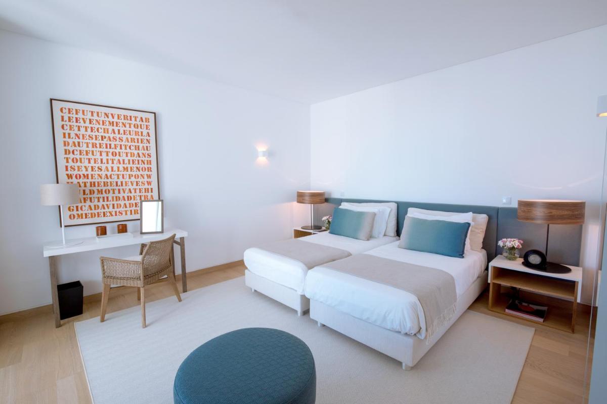 Uma cama ou camas num quarto em Monte Rei Golf & Country Club