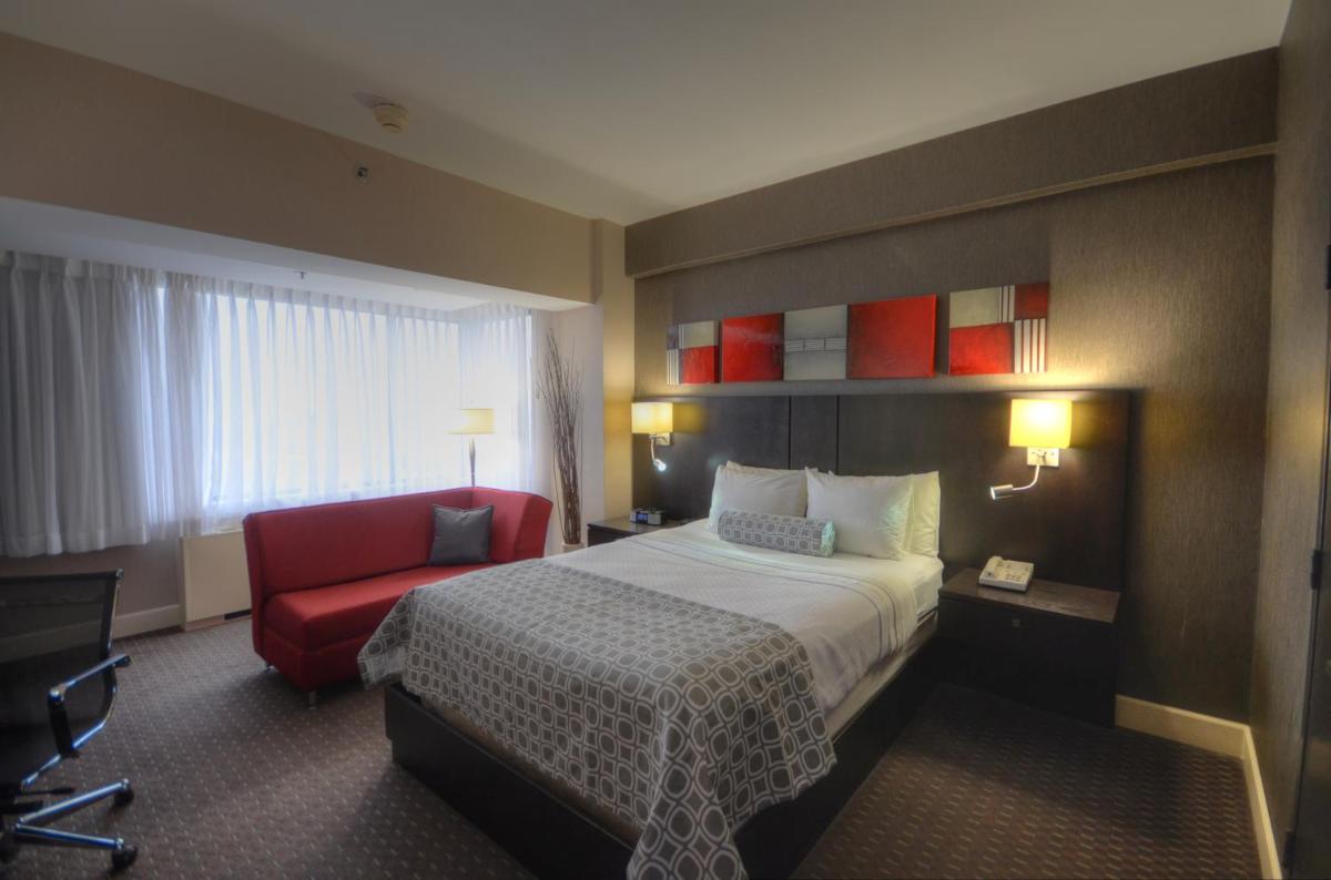 Armon Plaza Montreal Airpt, Trademark Collection by Wyndham - Housity