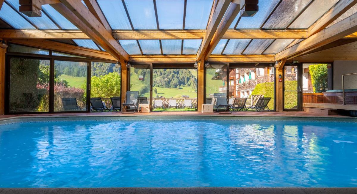 Piscine de l'établissement Hôtel Les Côtes, Résidence Loisirs et Chalets ou située à proximité