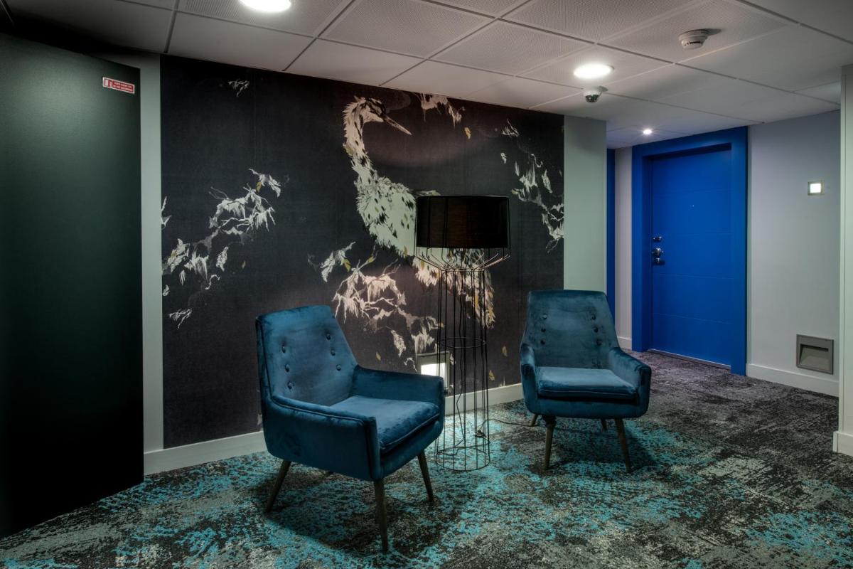 Coin salon dans l'établissement Best Western Aquakub