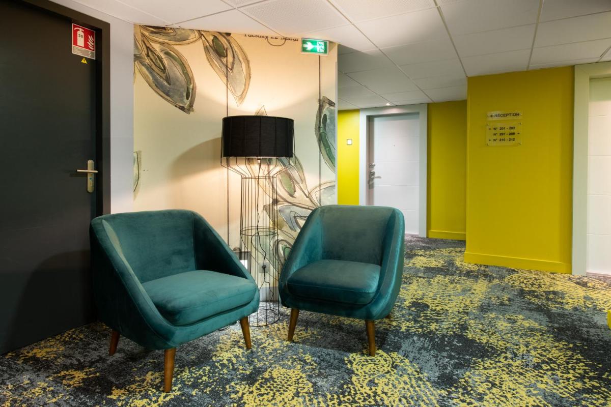 Coin salon dans l'établissement Best Western Aquakub