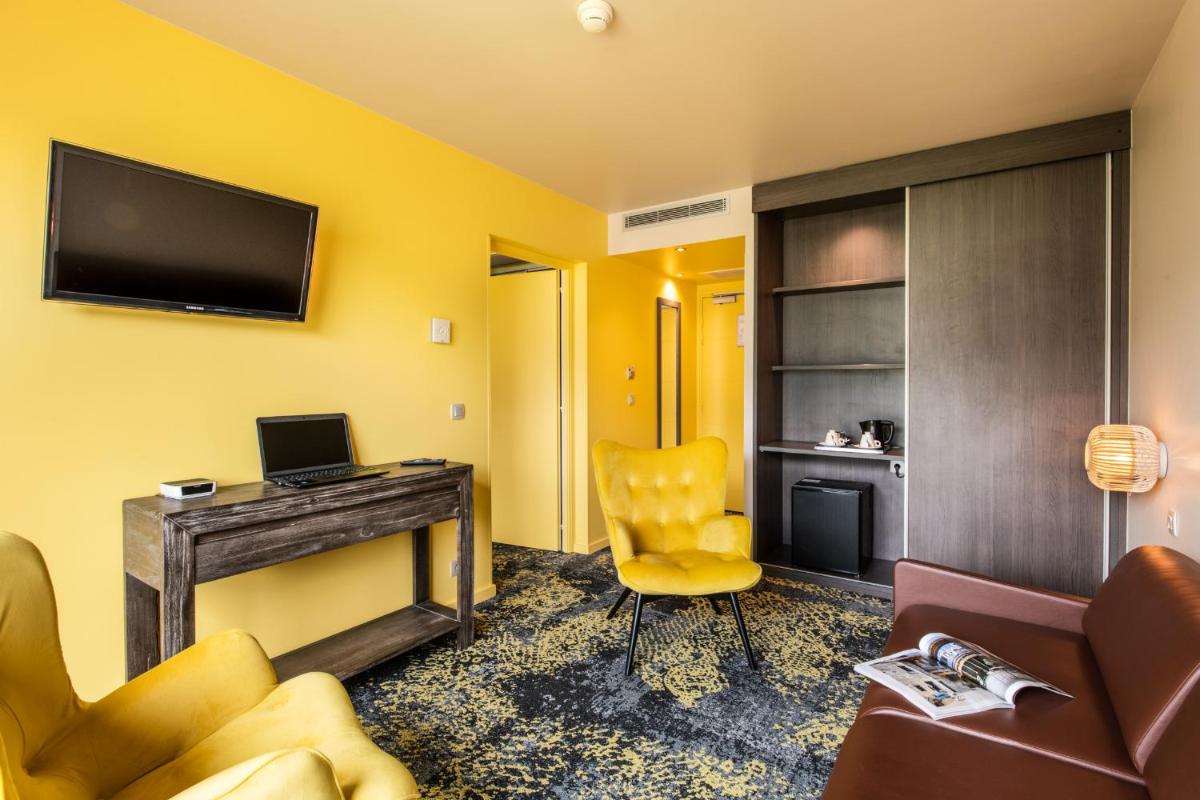 Télévision ou salle de divertissement dans l'établissement Best Western Aquakub