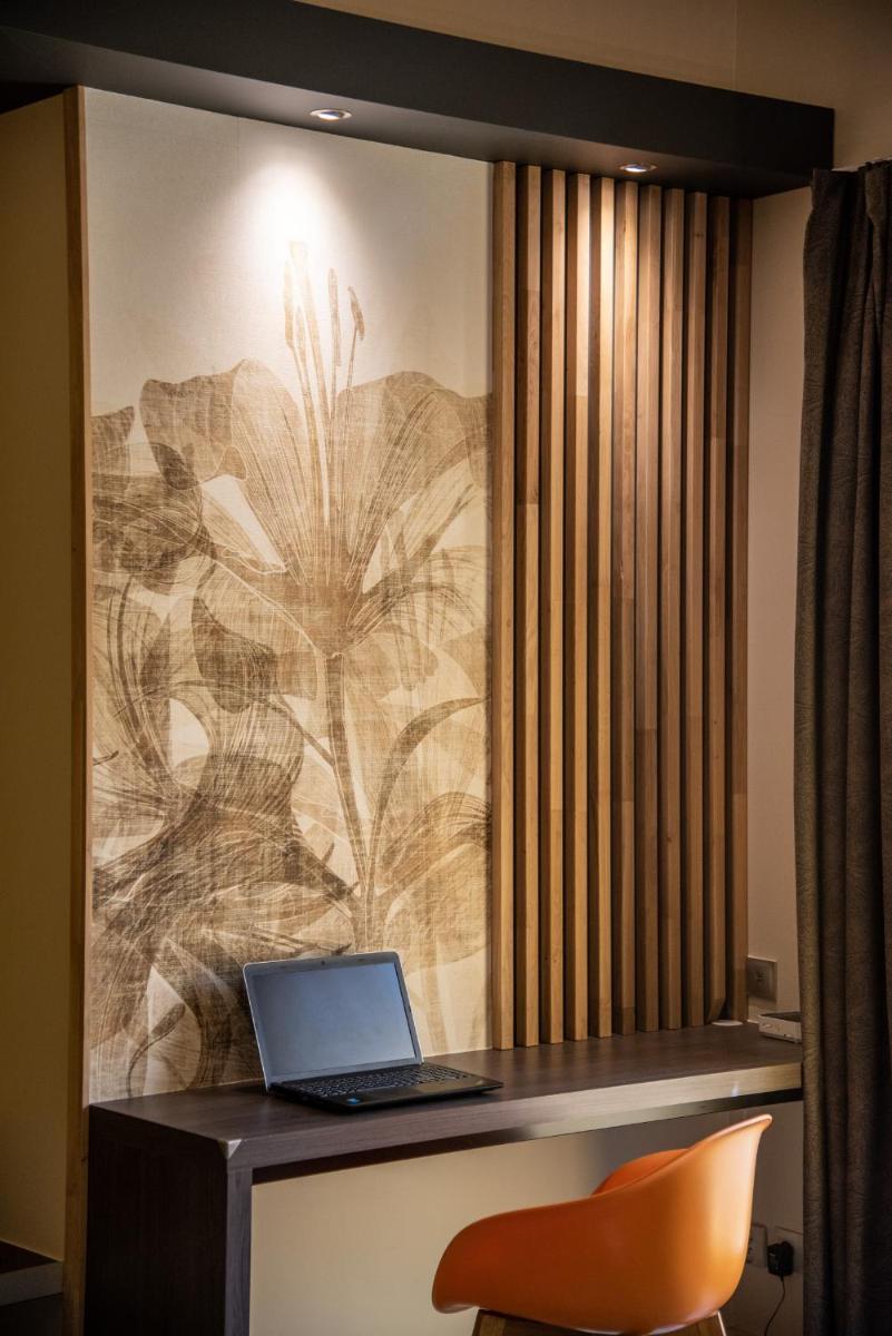 Télévision ou salle de divertissement dans l'établissement Best Western Aquakub