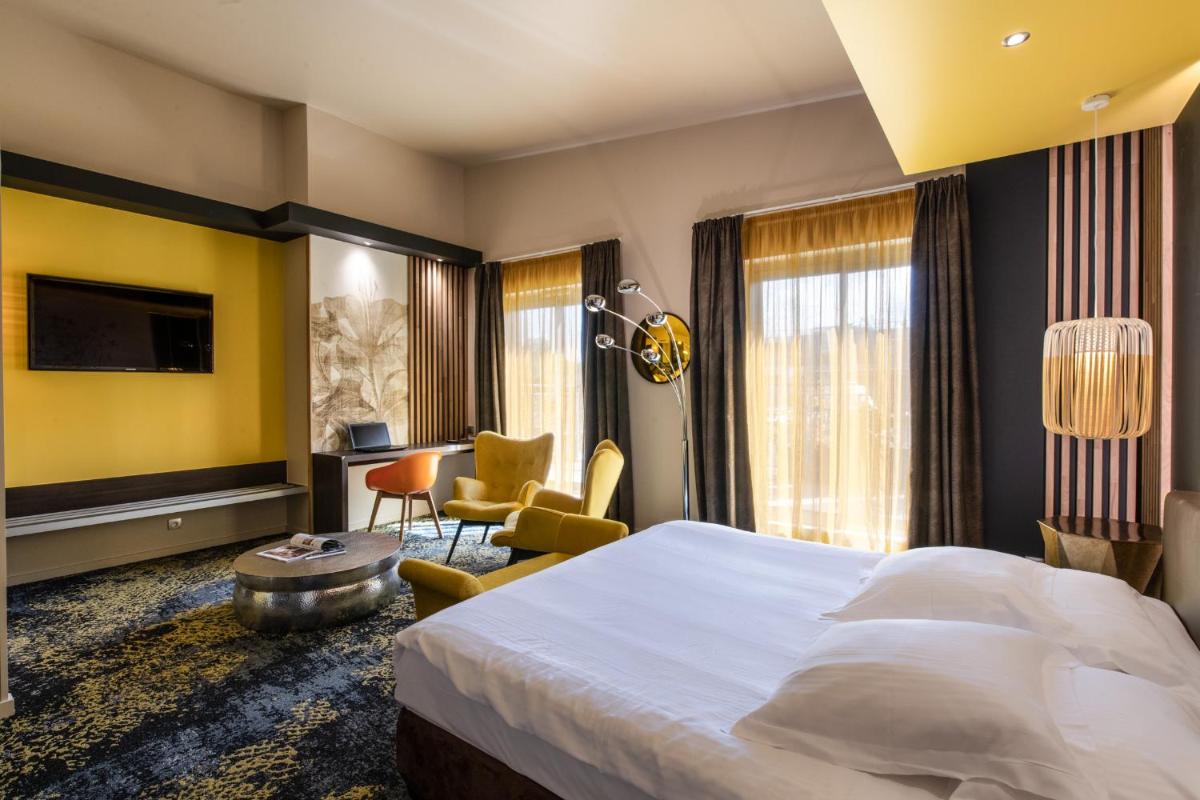Un ou plusieurs lits dans un hébergement de l'établissement Best Western Aquakub