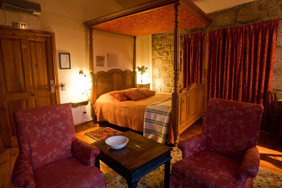 Uma cama ou camas num quarto em Hotel Rural Quinta da Geia