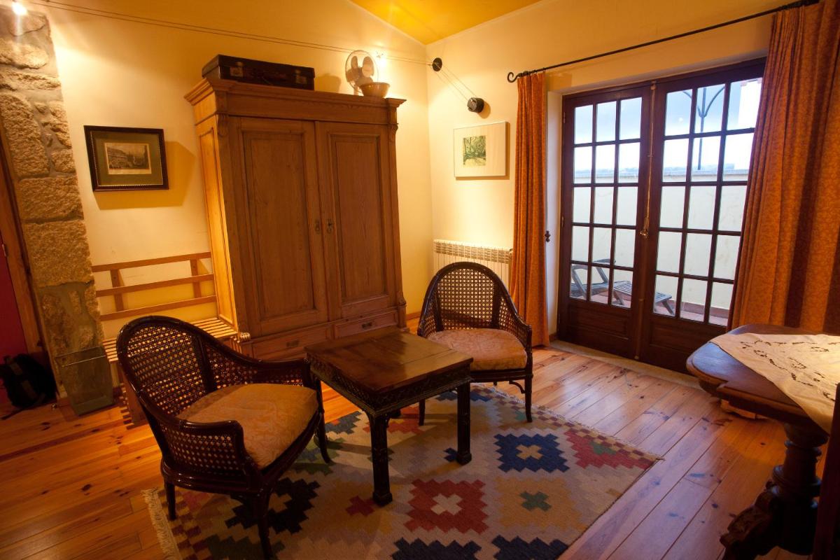 Uma área de estar em Hotel Rural Quinta da Geia