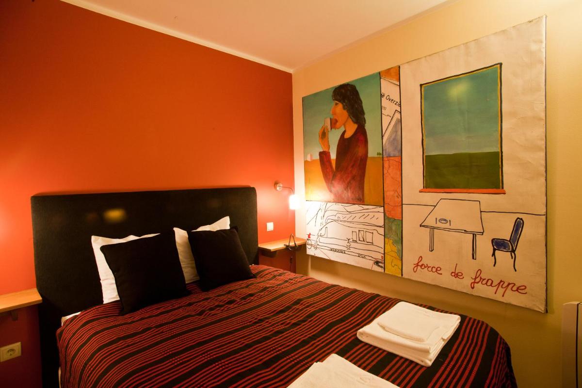 Uma cama ou camas num quarto em Hotel Rural Quinta da Geia