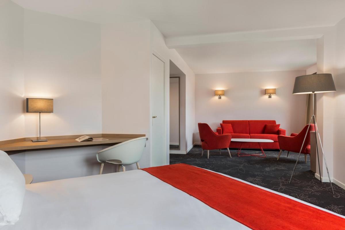 Un ou plusieurs lits dans un hébergement de l'établissement Holiday Inn Calais Coquelles by IHG