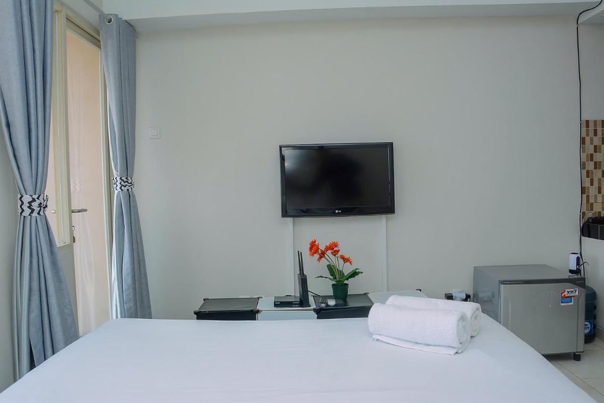 Elegant Studio Apartment Margonda Residence 5 By Travelio - Housity