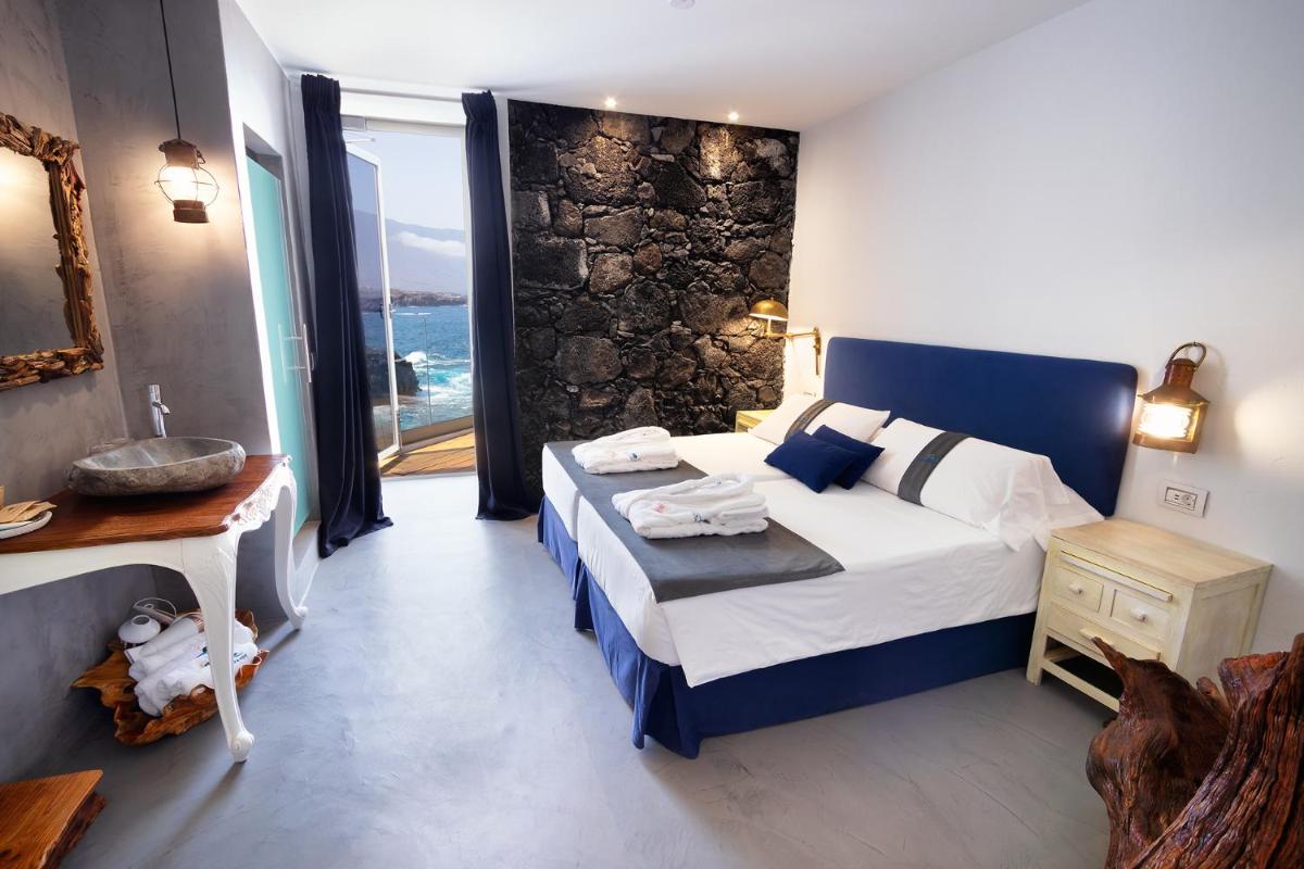 Cama o camas de una habitación en Hotel Puntagrande