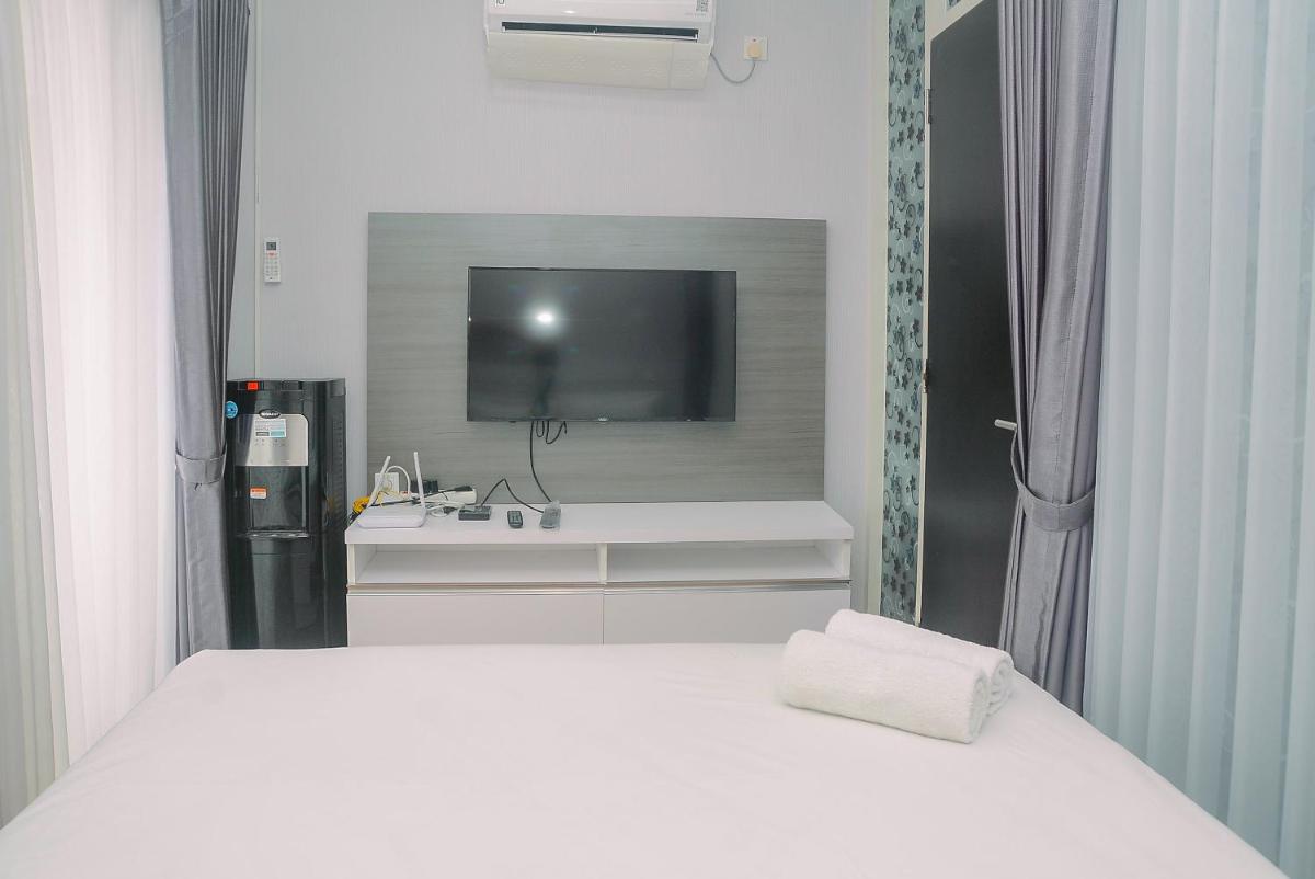 Comfy Strategic 1BR Apartment Atlanta Residence near Universitas Indonesia By Travelio - Housity