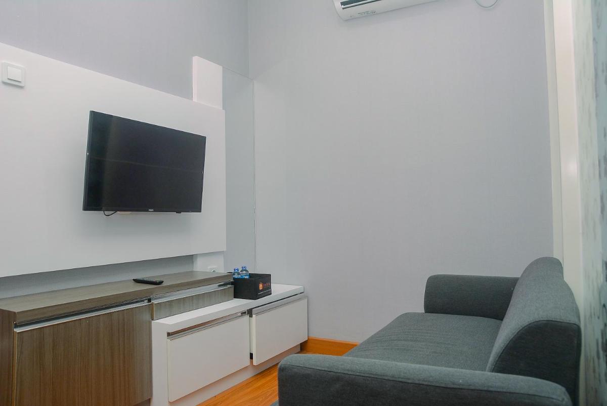 Comfy Strategic 1BR Apartment Atlanta Residence near Universitas Indonesia By Travelio - Housity