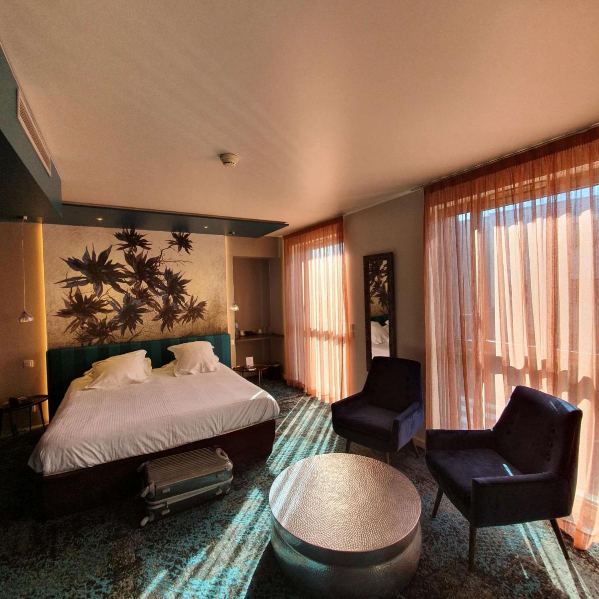 Un ou plusieurs lits dans un hébergement de l'établissement Best Western Aquakub