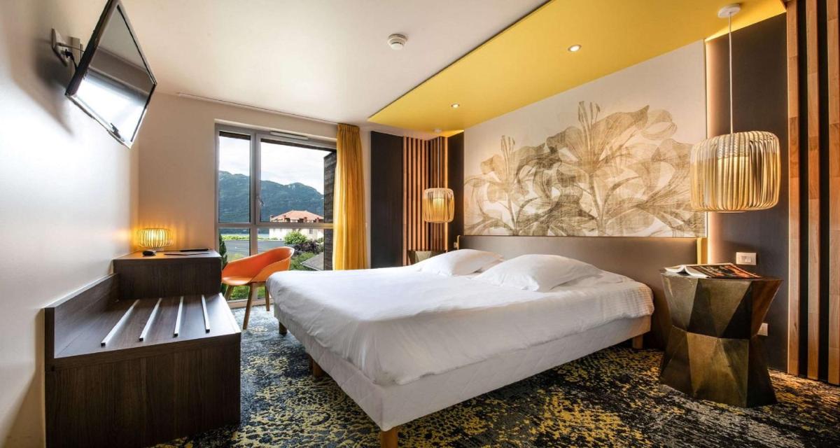 Un ou plusieurs lits dans un hébergement de l'établissement Best Western Aquakub