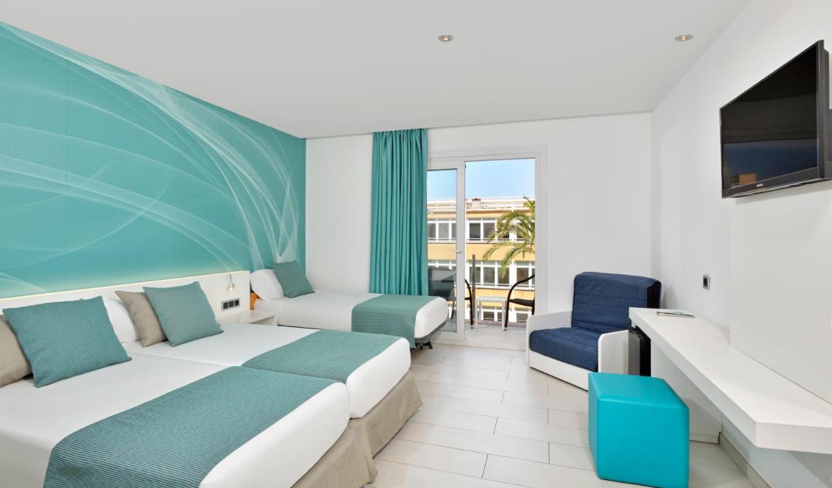 Cama o camas de una habitación en Hotel Hispania