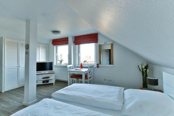 Haus Brönshoog, Appartement 11 in strandnaher Lage - Housity