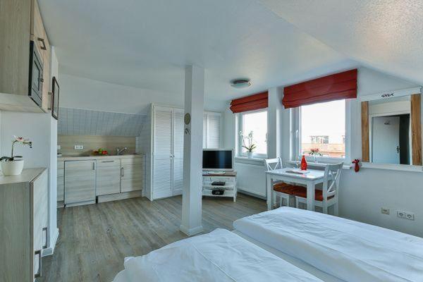 Haus Brönshoog, Appartement 11 in strandnaher Lage - Housity