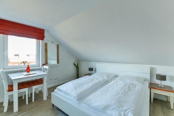 Haus Brönshoog, Appartement 11 in strandnaher Lage - Housity