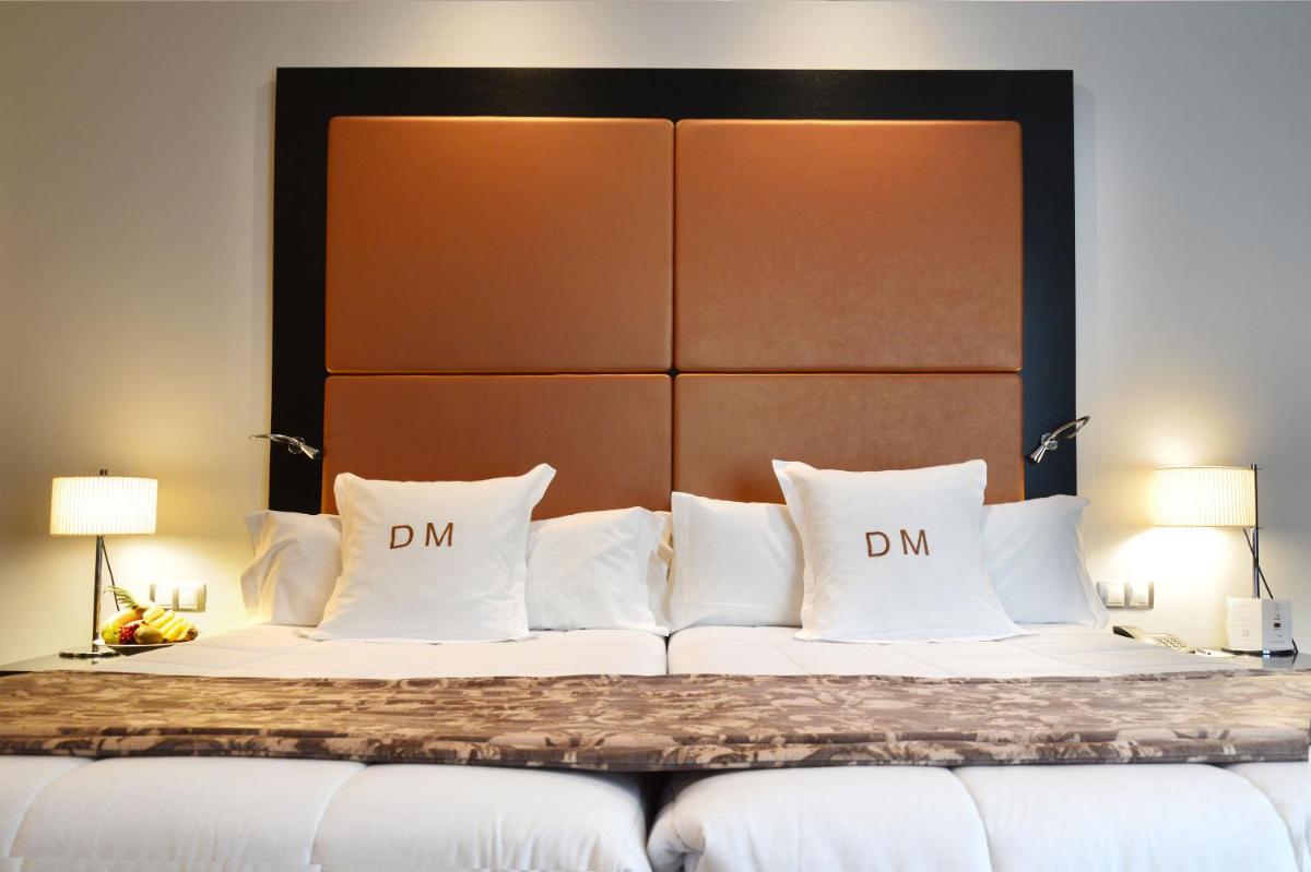 Cama o camas de una habitación en Gran Hotel Don Manuel