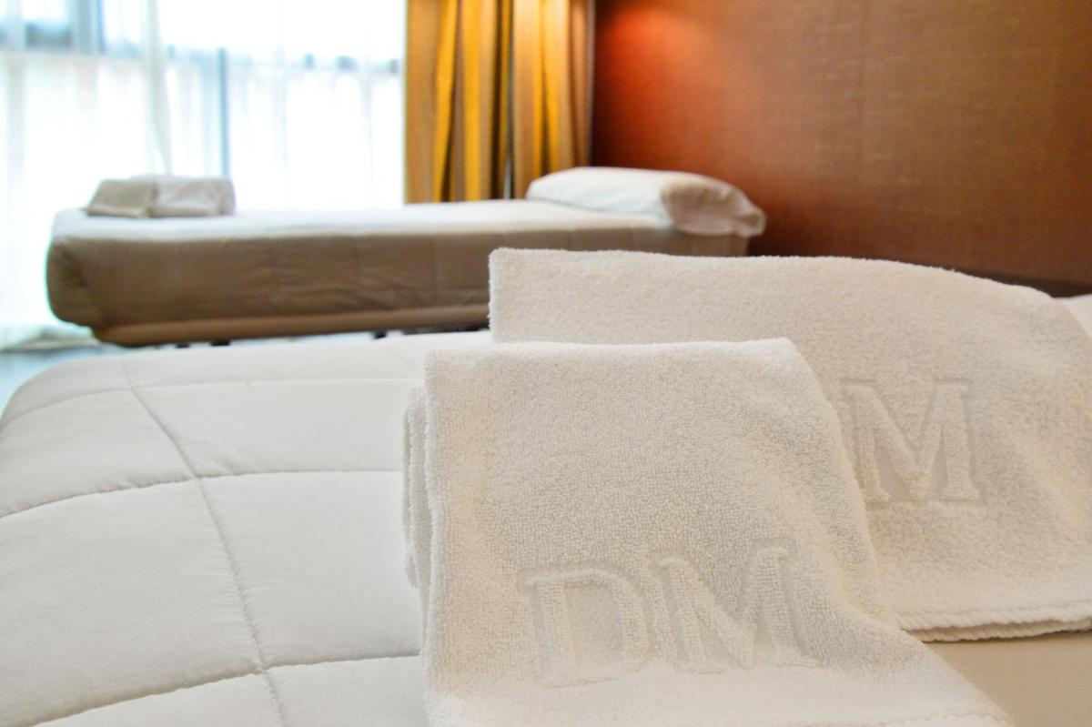 Cama o camas de una habitación en Gran Hotel Don Manuel