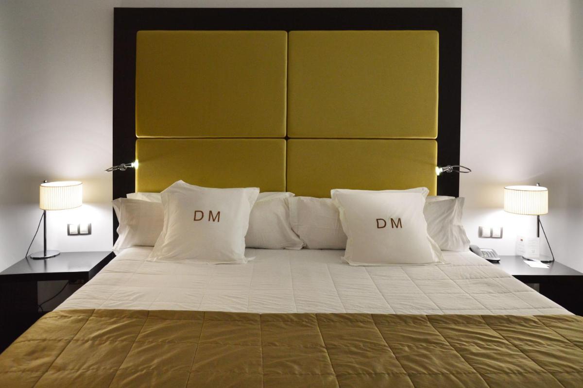 Cama o camas de una habitación en Gran Hotel Don Manuel