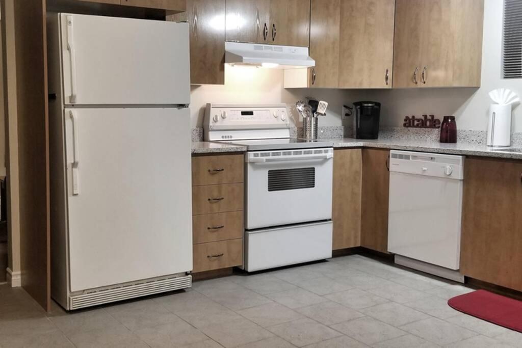 Cozy Spacious 2 Bedroom basement Apt by Amazing Property Rentals - Housity