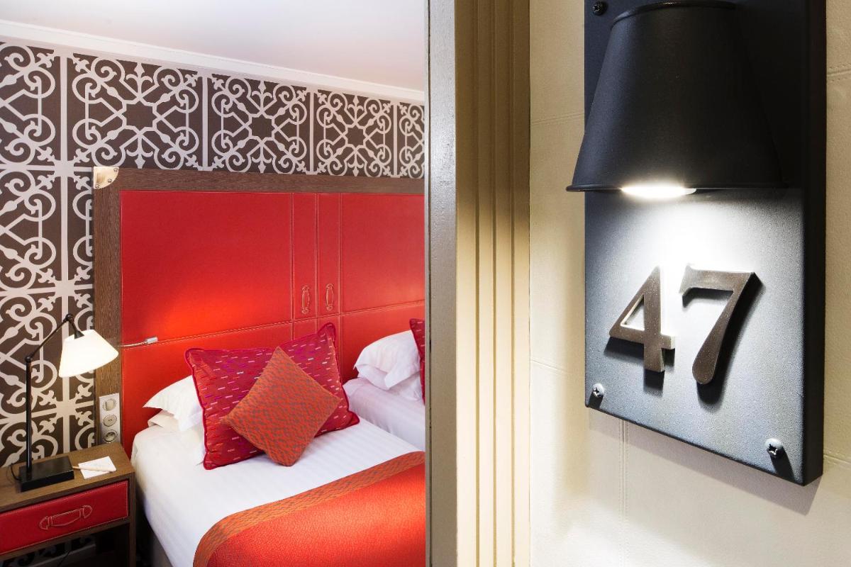 Un ou plusieurs lits dans un hébergement de l'établissement Hotel Phileas Lazare & Spa - Opera