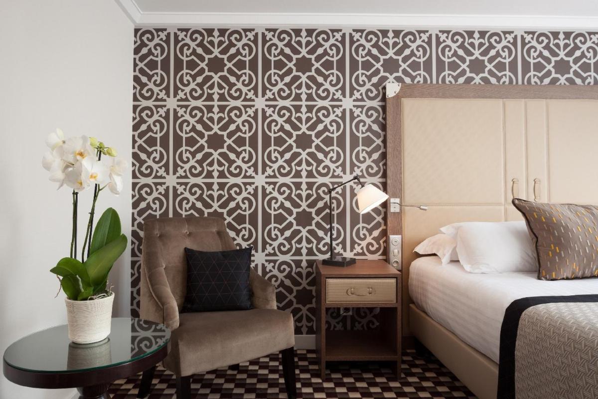Un ou plusieurs lits dans un hébergement de l'établissement Hotel Phileas Lazare & Spa - Opera