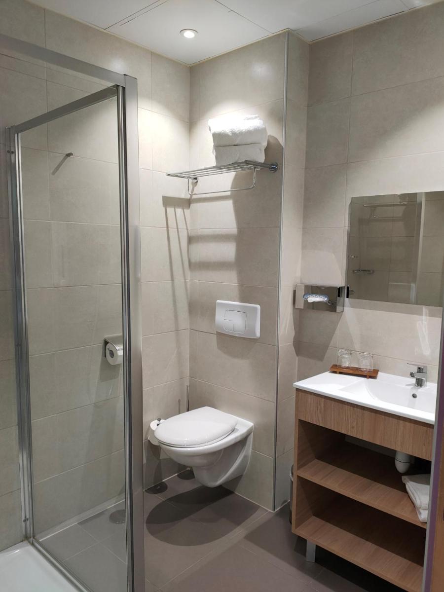 Salle de bains dans l'établissement Abbaye des Capucins Spa & Resort