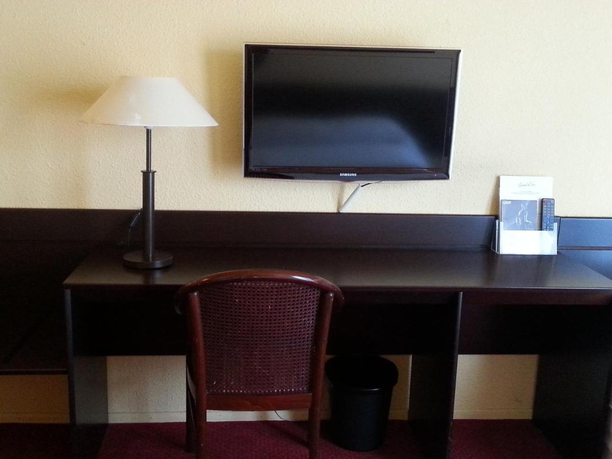 Télévision ou salle de divertissement dans l'établissement Espace Leonard De Vinci