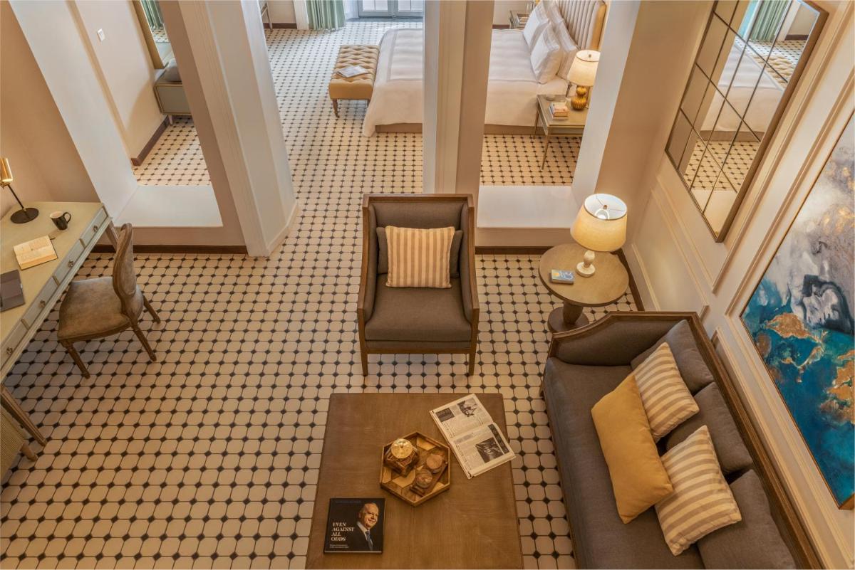 an overhead view of a living room with a couch at MansionHaus in Anjuna
